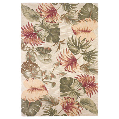 Tapis beige en laine à motif de feuilles de palmier