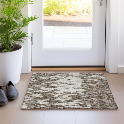 Tapis rectangulaire Aleighna avec envers antidérapant