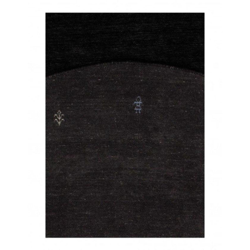 Kenjanae Area Rug in Black