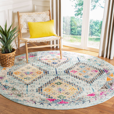 Felty Southwestern Blue/Yellow Area Rug