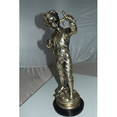 Dominica Boy with a Sling Bronze Statue -  Size: 10"L x 6.5"W x 21.5"H.
