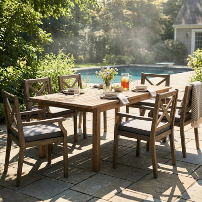 Ensemble de salle à manger 7 pièces en bois avec coussins gris pour l'extérieur. Construction robuste, sièges confortables, table extensible pour jardin et espaces extérieurs. Bois, salle à manger.