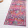 Tapis à motif floral rose