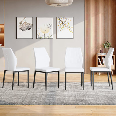 Ensemble de 4 chaises de salle à manger en noir et blanc, hauteur de 37 pouces: dossier ergonomique en polyuréthane, combinant confort et style. Mélange parfaitement confort et élégance, ajoutant plus de confort et de style à l'heure du repas.