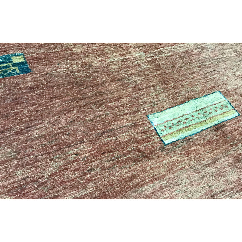 Tapis rose de haute qualité noué à la main