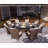 Pomos 8 - Person Wicker Patio Dining Set with Round Table , Cushions Included