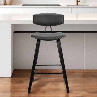 Chaise à dossier bas avec repose-pieds