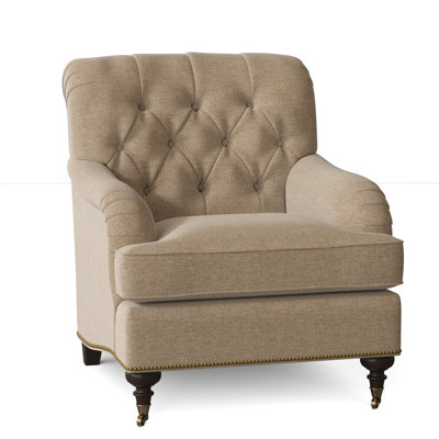 Fauteuil à coussin en duvet capitonné Devan