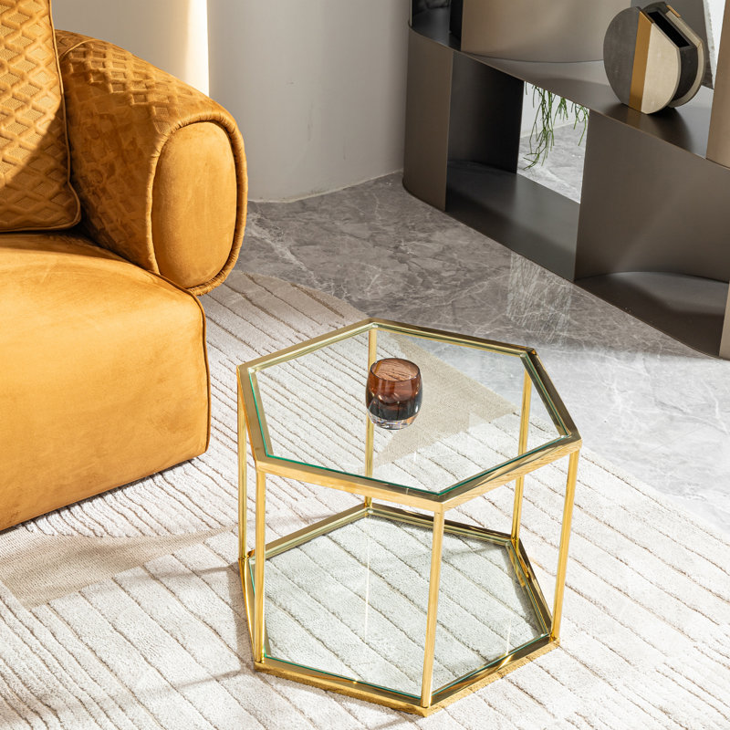 Table basse avec plateau en verre et cadre doré