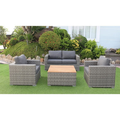 Deliza Acacia Wicker 4 - Person Patio Conversation Set with Cushions