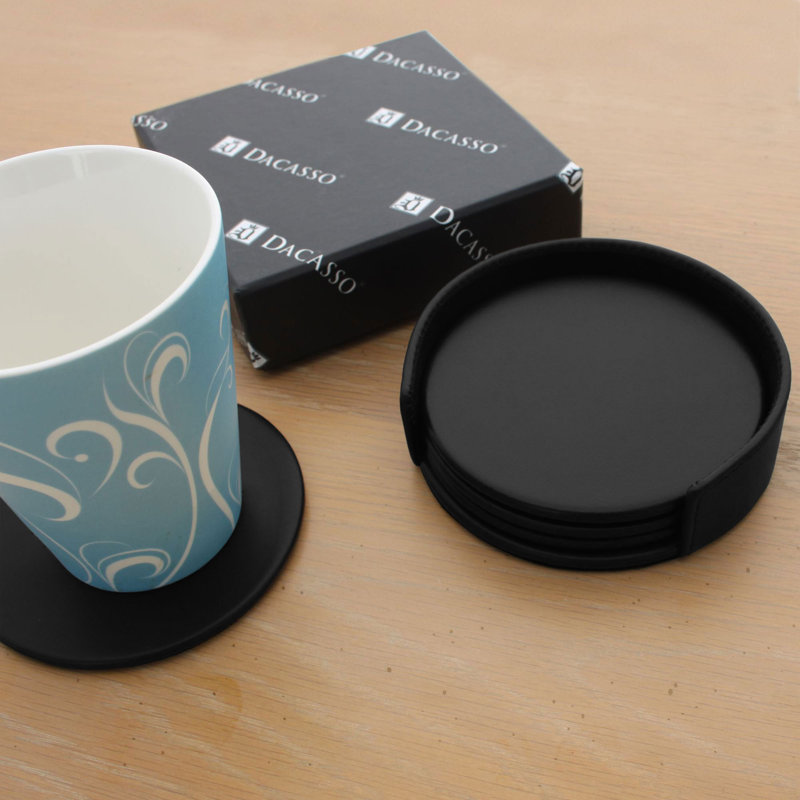 Ensemble de quatre sous-verres ronds avec porte-papier noir Bramfield
