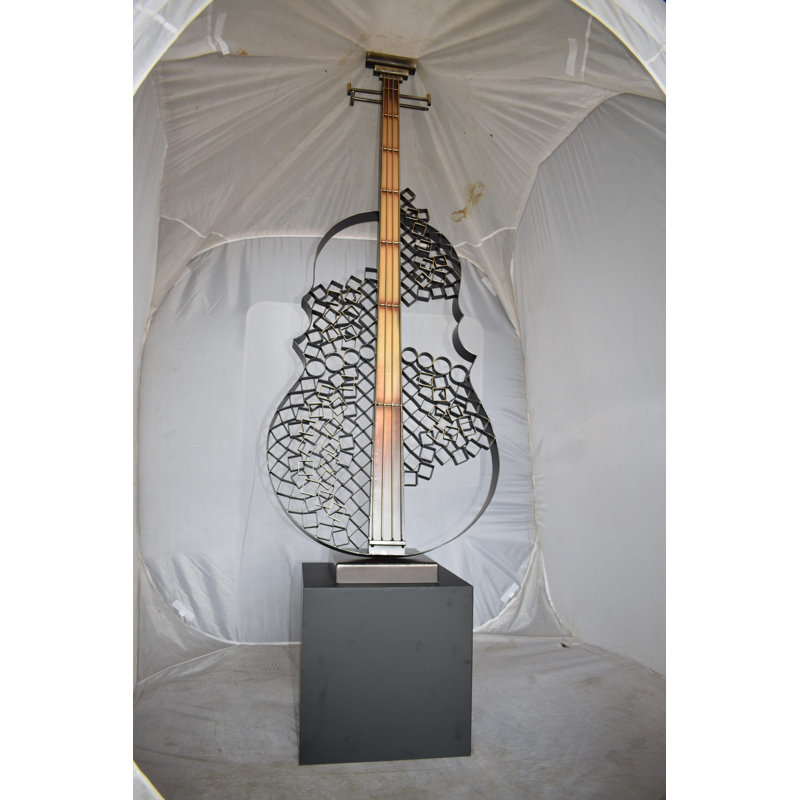 Voyd Guitar Sculpture Creative And Modern Metal Guitar on Base Art Piece Size: 21" x 18" x 71"H