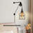 Kathyria Plug-in Armed Sconce