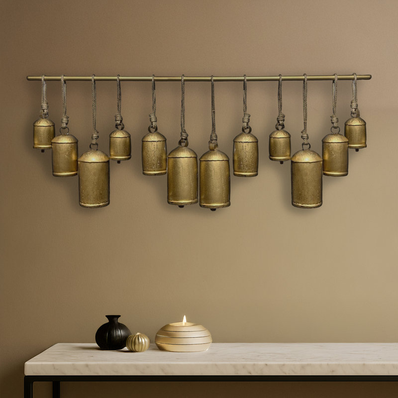 Neyra Iron Cow Bells Wall Decor 48 Inch Wide Decorative, Antique Gold Finish, Jute Hanging Rope