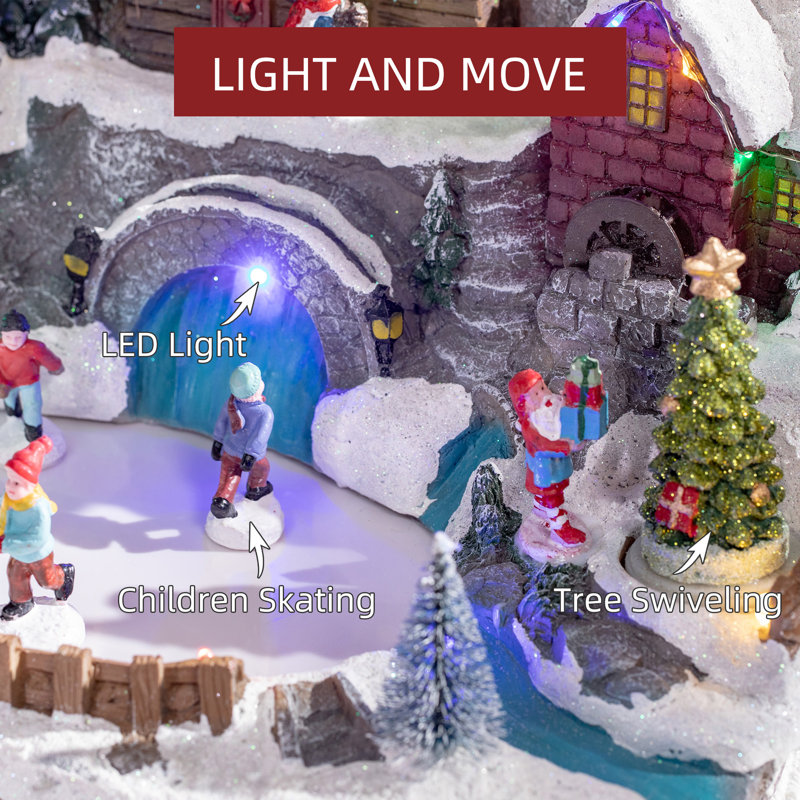 The Holiday Aisle® Christmas Village Skating Pond Animated Winter 