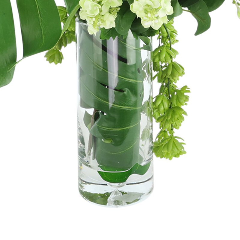 Arrangement delphinium, magnolia et lilas