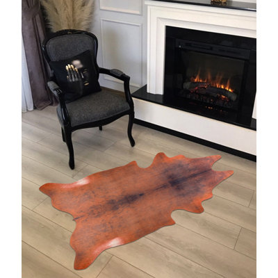 Tapis orange en similicuir Novelty Helmine