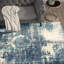 Tapis performance bleu à motif abstrait rétro tissé à la machine Kazu-23859623