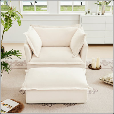 Confortable ensemble de fauteuils rembourrés avec repose-pieds pour le salon, rehaussant la détente et le style.