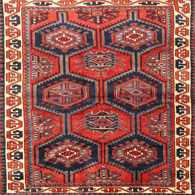 Tapis rouge à motif sud-ouest
