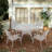Rhedyn 4 - Person Round Outdoor Cast Aluminum Dining Set with Umbrella Hole-108657742