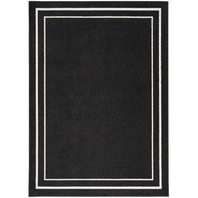 Aubreanna Abstract Machine Woven Chenille Indoor/Outdoor Area Rug in Black