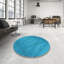 Tapis bleu sarcelle à motif géométrique-858207777