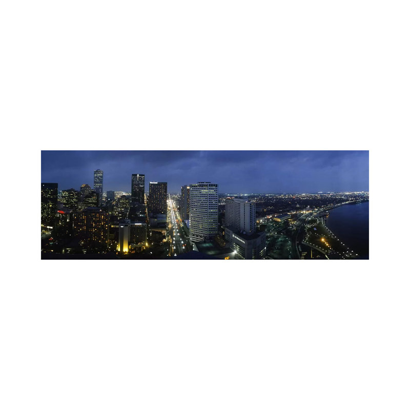 High Angle View Of Buildings In A City Lit Up At Night - Wrapped Canvas Panoramic Print, 30.48 cm H x 91.44 cm W x 1.91 cm D