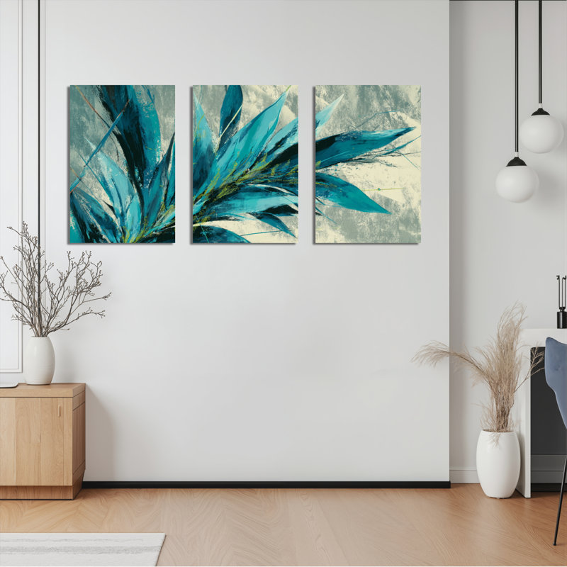 Ensemble de 3 tableaux abstraits à motifs de feuilles bleues sur toile tendue, H 18 po x l 36 po