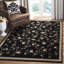 Tapis à motif floral Carolane-19261402