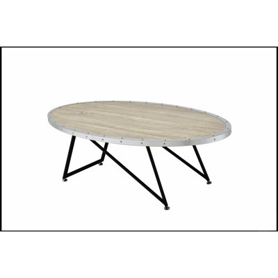 Table basse en chêne vieilli et en métal, idéale pour ajouter une touche rustique et une élégance moderne à votre salon.