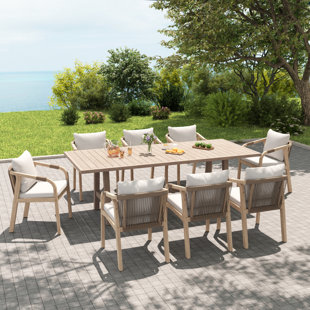 Ensemble repas d'extérieur en bois d'acacia avec coussins