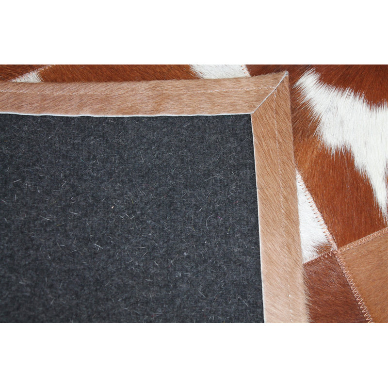 Handmade Natural Brown and White Cowhide Patchwork Rug, 4' x 6'