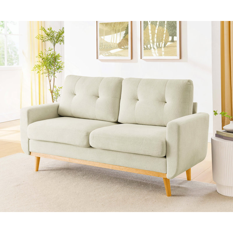 Canapé large rembourré capitonné Mid-Century avec pieds en bois, Crème