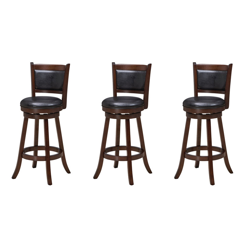 Ensemble de trois tabourets de bar adossés par la salle de jeux RAM, Gris
