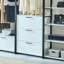 Système de garde-robe autoportant en bois avec cadre en métal