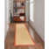 Nannette Handmade Medium Beige Berber with Burnt Orange Cotton Border Area Rug
