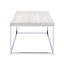 Table basse élégante avec ornement en chêne et base rectangulaire de style traîneau