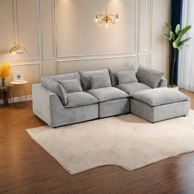 Canapé modulaire spacieux en velours gris antique pour salon moderne