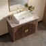 Meuble-lavabo moderne de 36 po de style Mid-Century avec comptoir en pierre frittée, vasque en céramique, armoire grillagée et poignée dorée