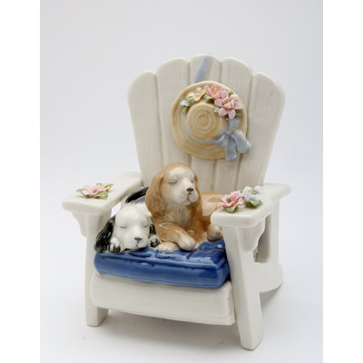 Figurine musicale chiens sur chaise de jardin