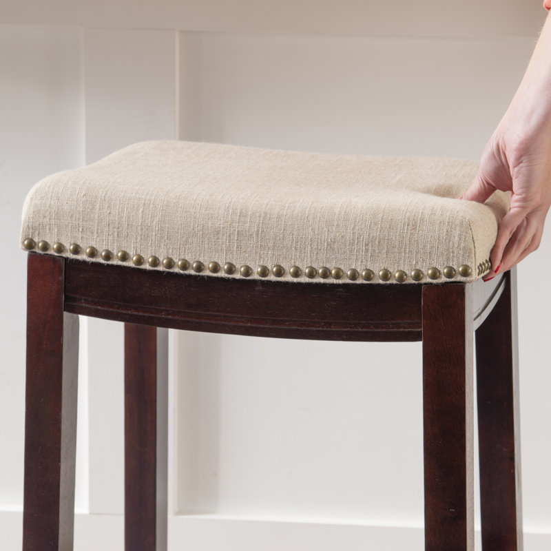 Tabouret de comptoir et de bar en bois massif sans dossier avec siège rembourré Bartonville, Beige lin / Noyer foncé