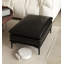 Repose-pieds en cuir noir avec repose-pieds
