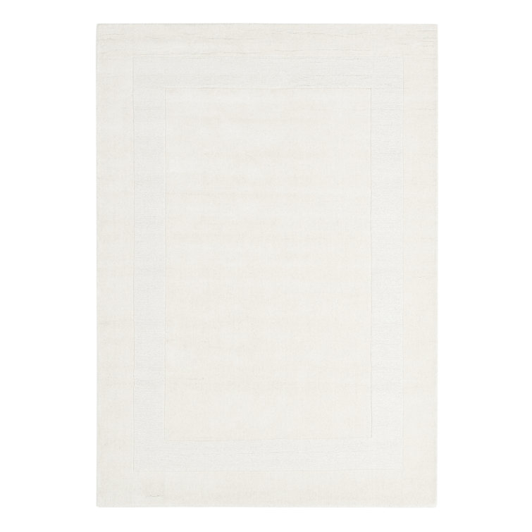 Larentius Solid Colour Hand Woven Hand Tufted Cream Area Rug