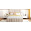 Lit tapissier beige avec système de rangement hydraulique efficace