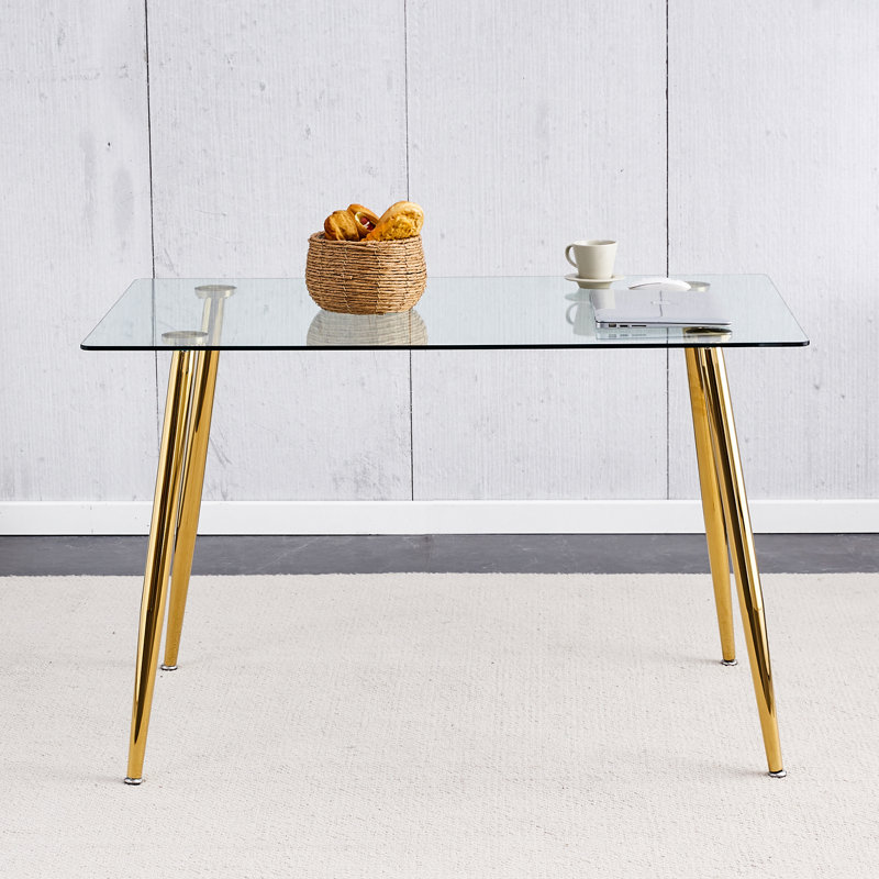 Élégante table en verre plaqué or moderne pour une utilisation polyvalente