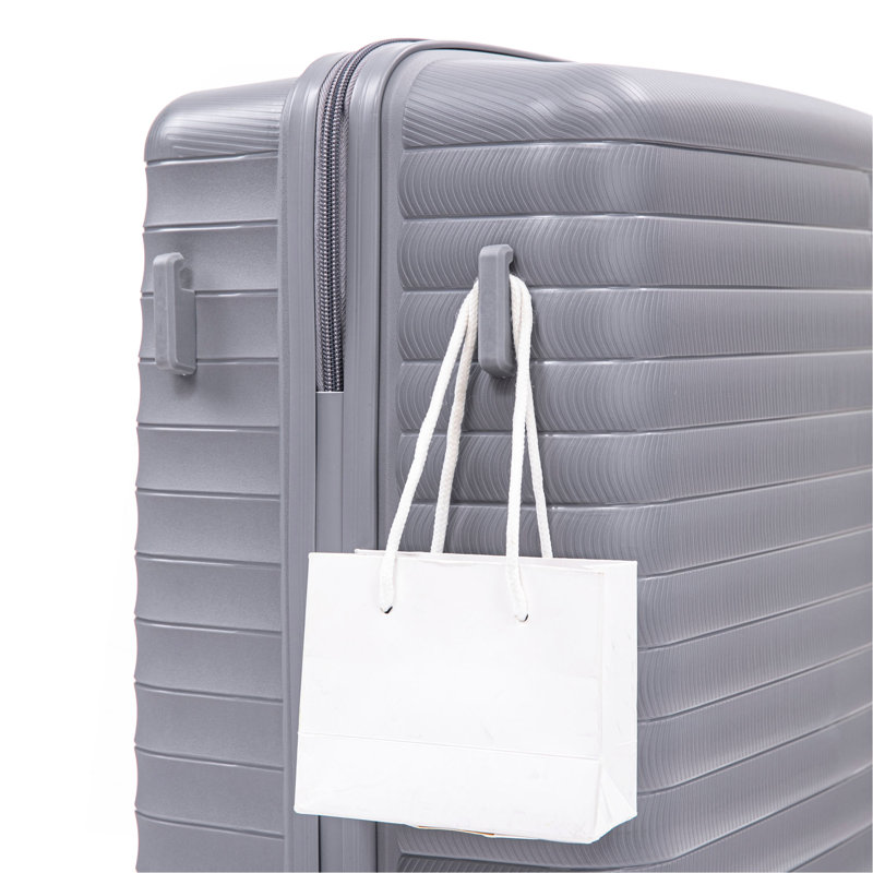14 "/ 20" / 24 "/ 28" 4 pièces / ensemble dans une valise à roulettes en PP, une valise de transport, une tringle en fer, une serrure à mot de passe à combinaison, un étui à cosmétiques de 14 po