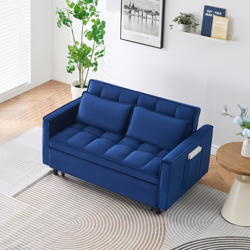 '' dreamlike blue velvet sofa with elegant design, convenient pockets, and three-in-one convertible functionality.