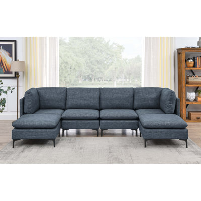 Cheryal 123" Wide Reversible Modular Sofa & Chaise with Ottoman by Wade Logan