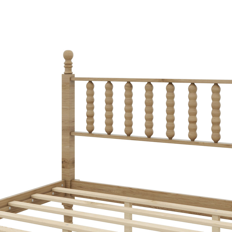 Grand lit plateforme en bois avec tête de lit d'inspiration gourde